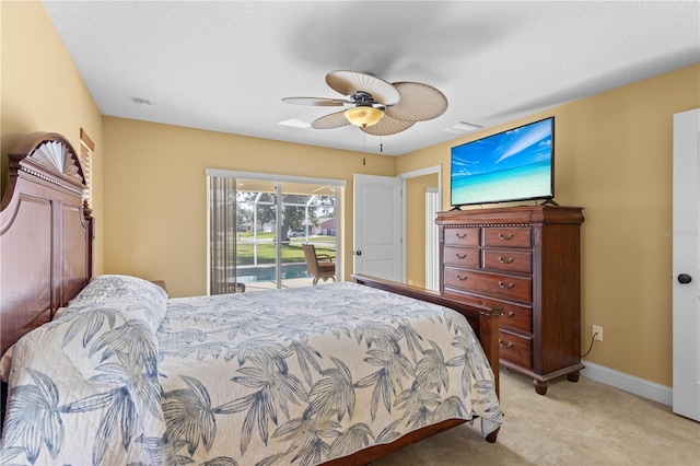 bedroom featuring access to exterior and ceiling fan