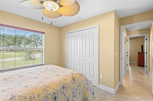 bedroom featuring a closet and ceiling fan