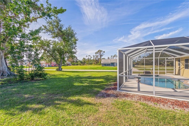 view of yard featuring a lanai