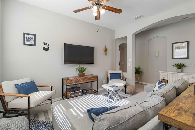 living room featuring ceiling fan