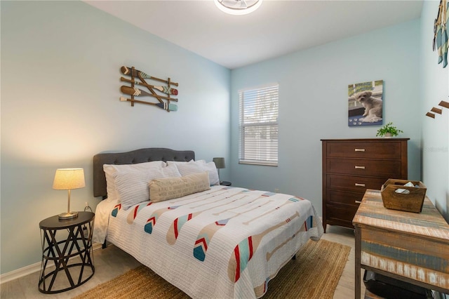 bedroom featuring light wood-type flooring