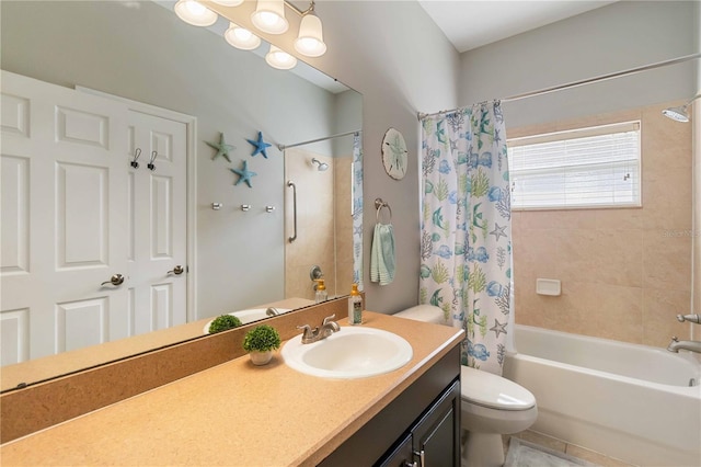 full bathroom with tile patterned floors, vanity, shower / tub combo, and toilet