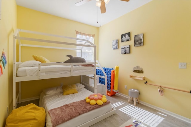 bedroom featuring ceiling fan and light hardwood / wood-style floors