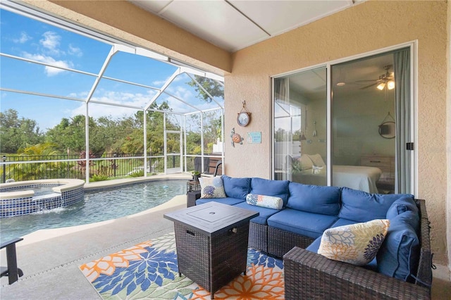 view of patio with outdoor lounge area, a lanai, and a pool with hot tub