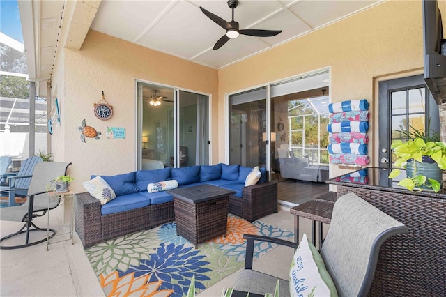 view of patio / terrace with outdoor lounge area, ceiling fan, and a lanai