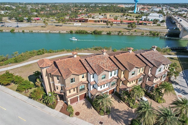 aerial view with a water view and a residential view