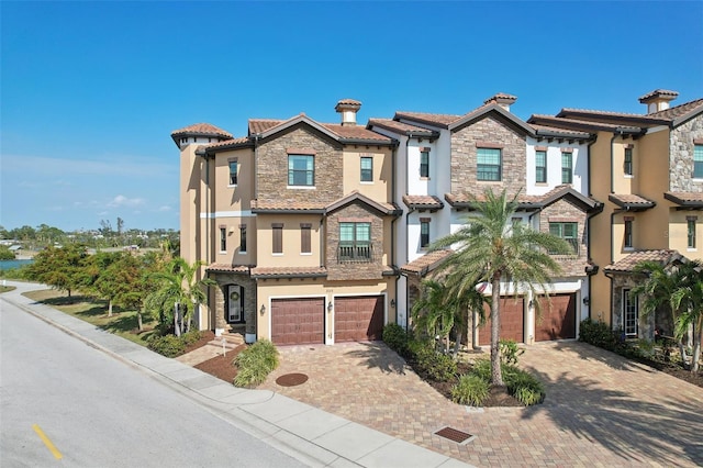 view of front of home with a garage