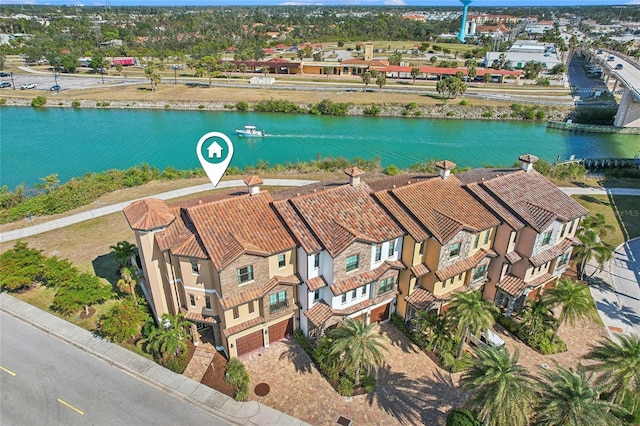 aerial view with a water view and a residential view