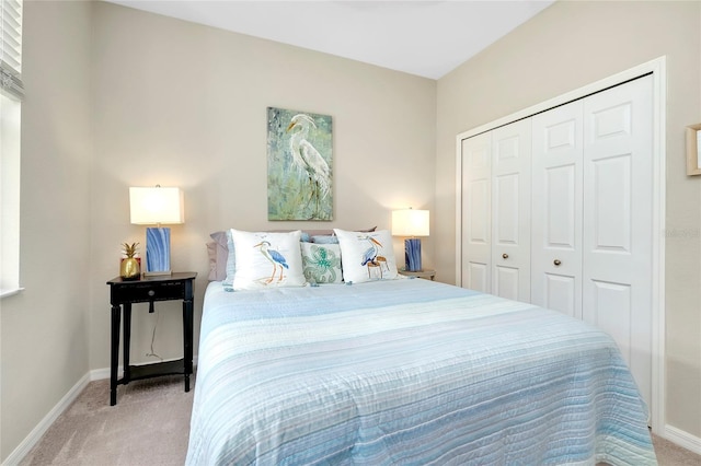 carpeted bedroom with a closet