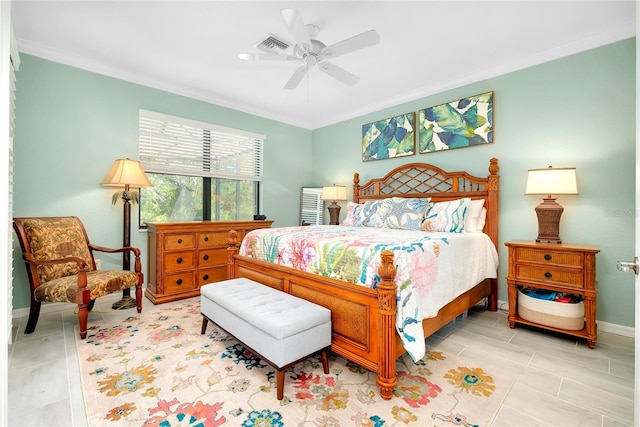 tiled bedroom with ceiling fan and crown molding