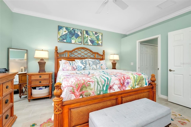 tiled bedroom featuring a closet, ceiling fan, and ornamental molding