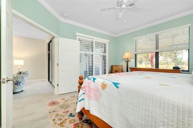 bedroom featuring ceiling fan, crown molding, and light tile patterned flooring