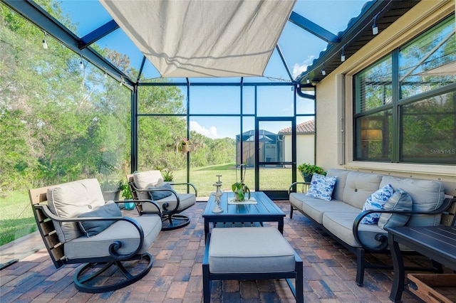 view of patio / terrace featuring a lanai and an outdoor hangout area