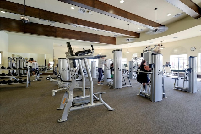 workout area featuring ceiling fan