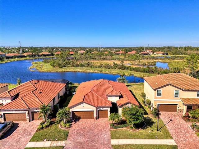 drone / aerial view with a water view