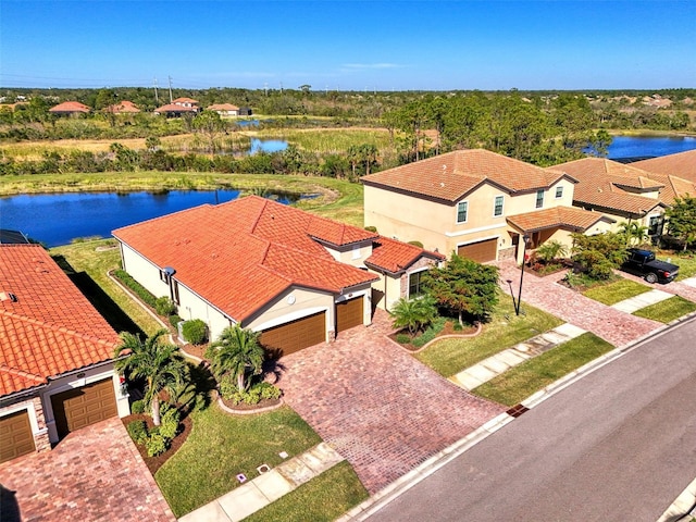 drone / aerial view featuring a water view