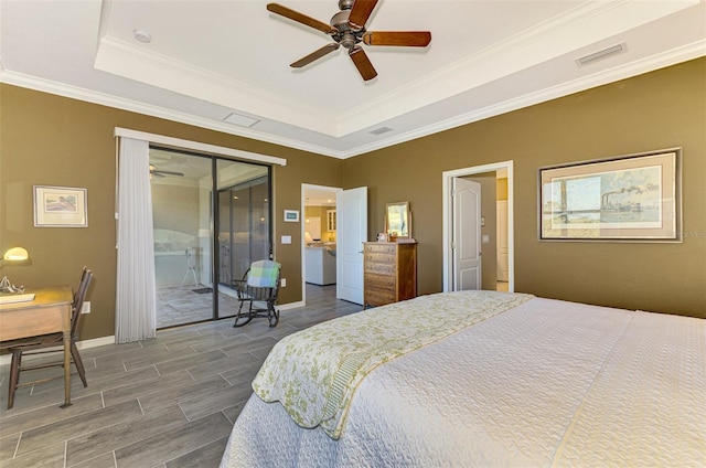 bedroom featuring access to exterior, a raised ceiling, ceiling fan, and ornamental molding