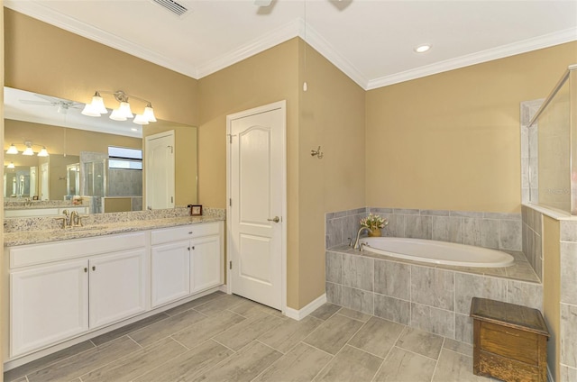 bathroom with plus walk in shower, vanity, and ornamental molding