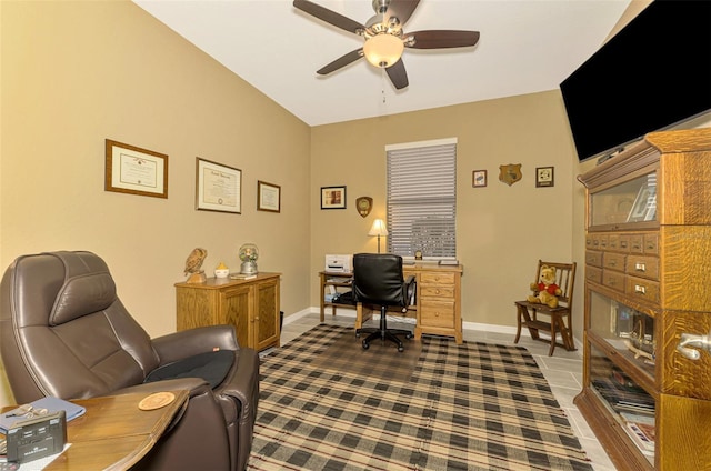 office area with tile patterned floors and ceiling fan