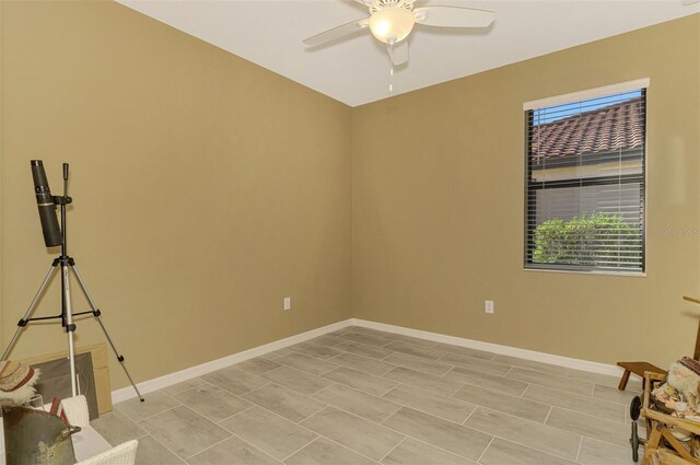 spare room featuring ceiling fan