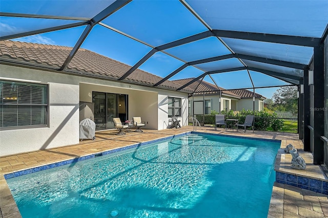 outdoor pool featuring a patio