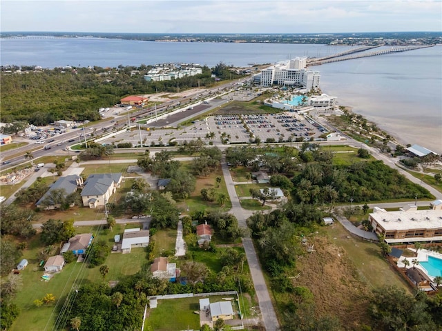 drone / aerial view with a water view