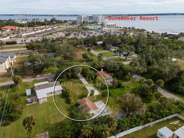 birds eye view of property featuring a water view