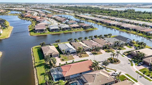 drone / aerial view with a water view