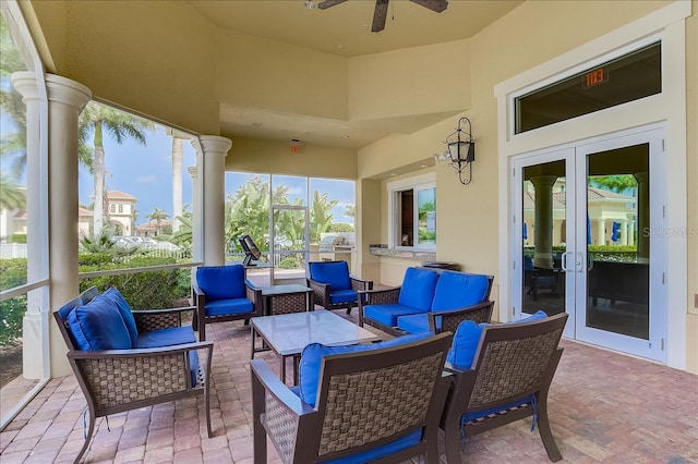 view of patio / terrace featuring an outdoor living space, french doors, and ceiling fan