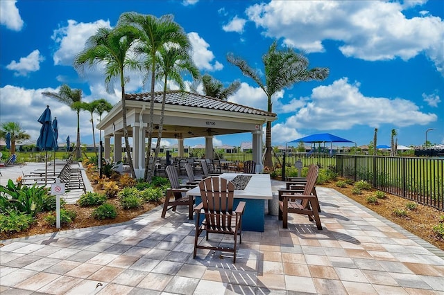 view of patio featuring a gazebo and an outdoor bar