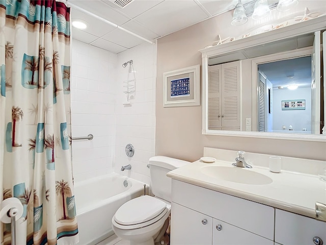 full bathroom featuring vanity, toilet, and shower / tub combo with curtain