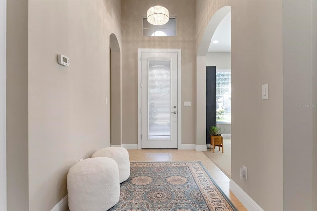 foyer featuring light tile patterned floors