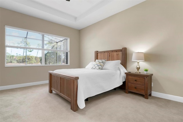 bedroom with ceiling fan and light colored carpet