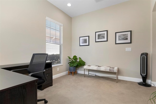 carpeted office with a wealth of natural light