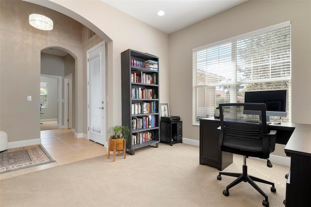 office space featuring light colored carpet