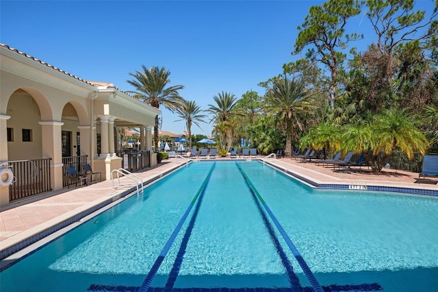 view of pool featuring a patio area