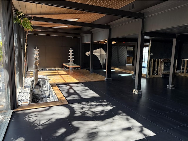 garage featuring wooden ceiling