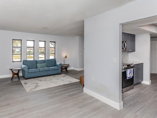 living room with light hardwood / wood-style floors