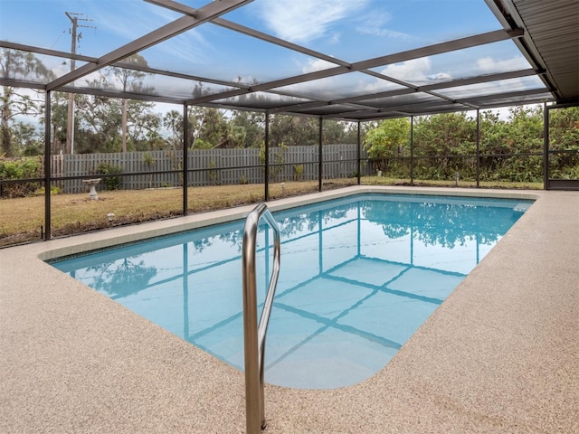 view of pool featuring a lanai