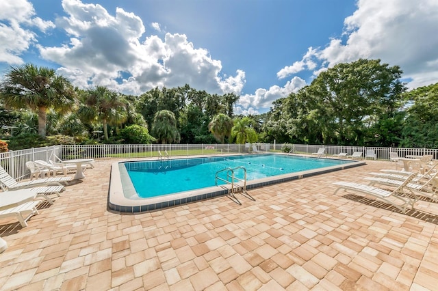 view of pool featuring a patio