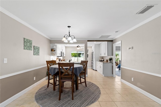 dining space with crown molding, light tile patterned floors, and ceiling fan with notable chandelier