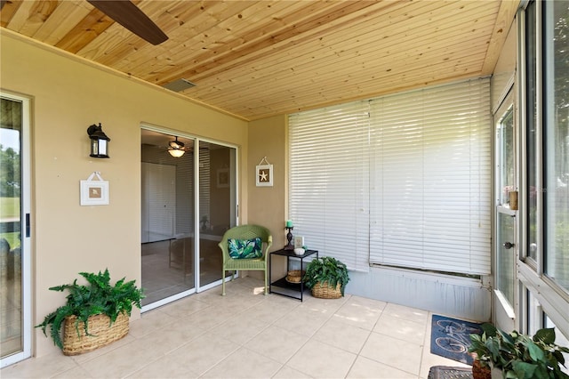 sunroom with wood ceiling