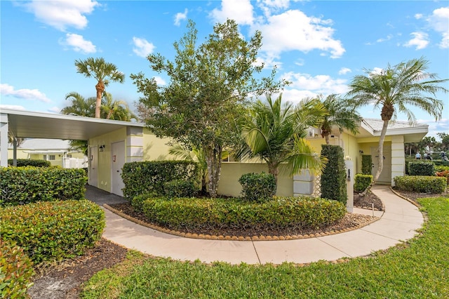 view of front of house featuring a carport