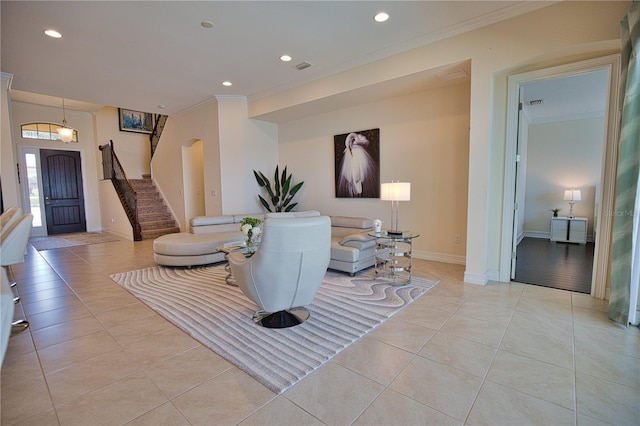 tiled living room featuring crown molding