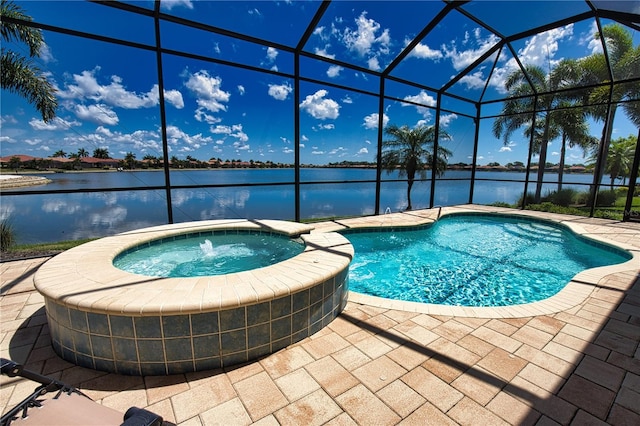 view of pool featuring a lanai, a water view, and an in ground hot tub