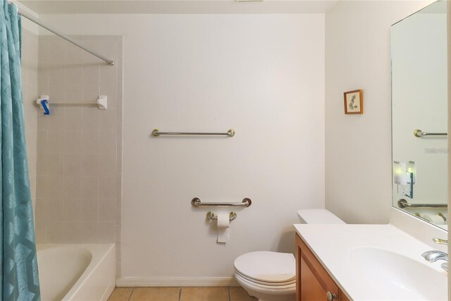 full bathroom with tile patterned floors, vanity, shower / bath combination with curtain, and toilet