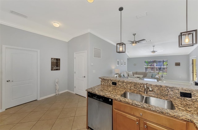 kitchen with dishwasher, sink, hanging light fixtures, vaulted ceiling, and light tile patterned floors