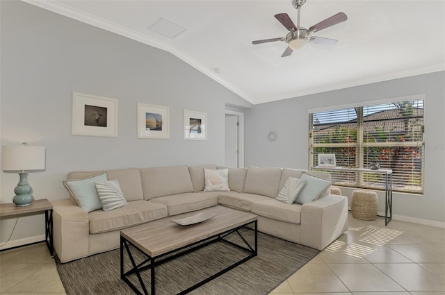 tiled living room with ceiling fan, lofted ceiling, and ornamental molding