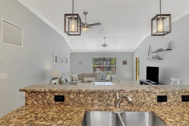11679 Anhinga Ave, Venice, FL 34292 - kitchen featuring vaulted ceiling, a sink, ornamental molding, a ceiling fan, and open floor plan