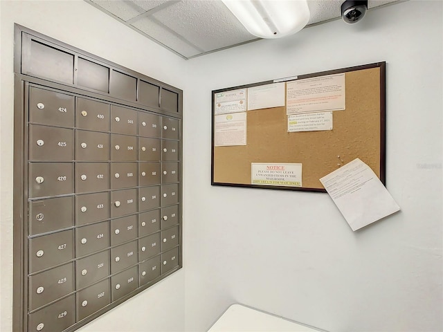 view of home's community featuring mail boxes